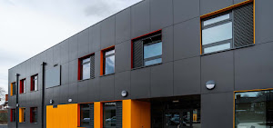 Alucobond composite panel cladding installed on a large commercial building in Ghana