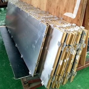 Stacked Alucobond aluminium composite panels ready for installation in Ghana