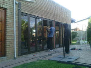 Laser cut decorative metal screen panel installed by Alucobond Ghana on a building in Ghana