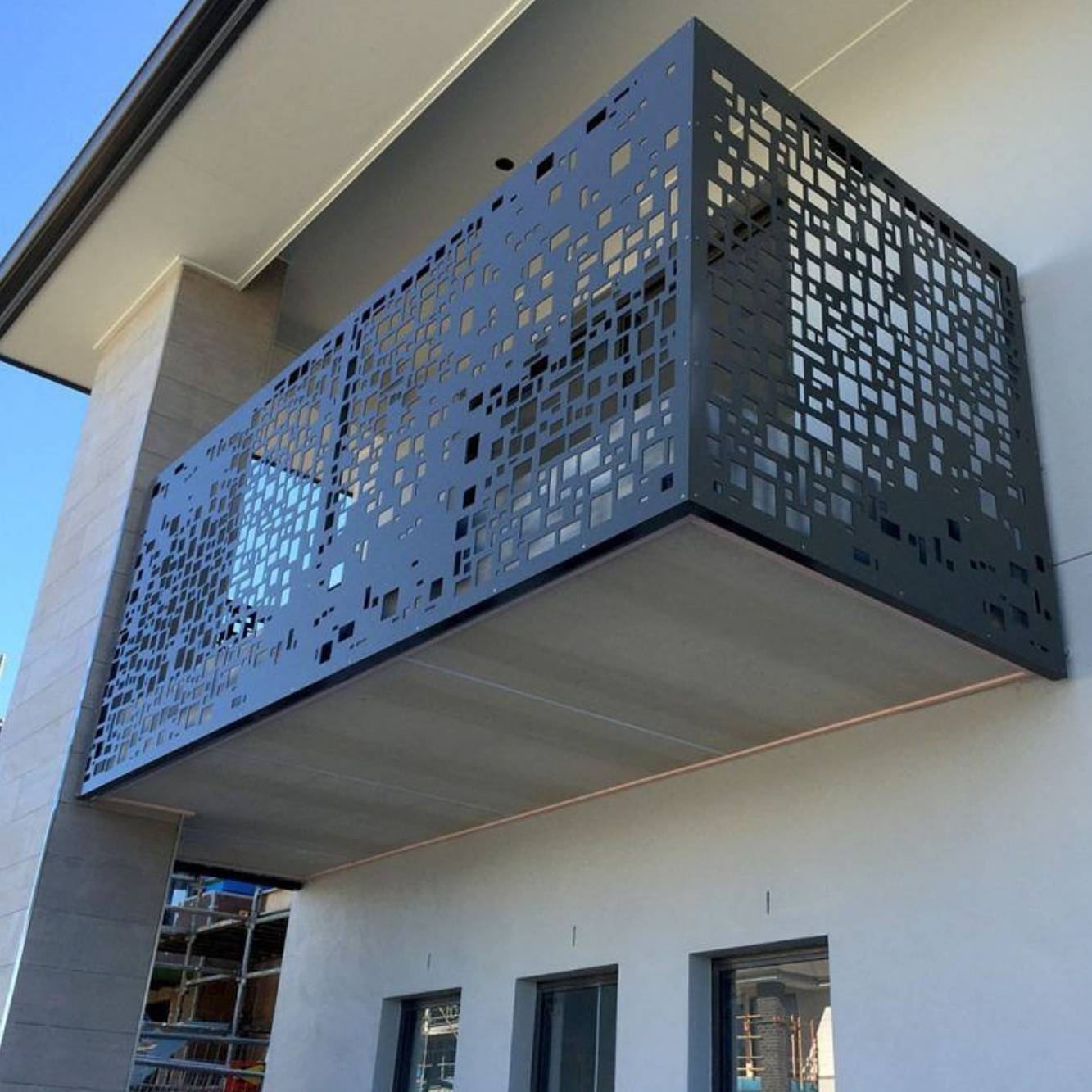 Modern balcony with laser cut decorative metal screen installed by Alucobond Ghana